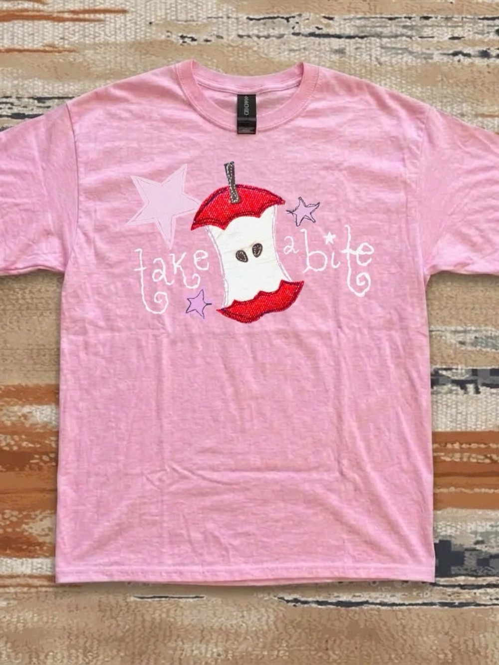 Gildan Pink Short-Sleeve Tee with Red Apple-Core Graphic